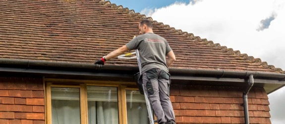 our team cleaning the gutters on a house in Stoke Bishop, Berkshire